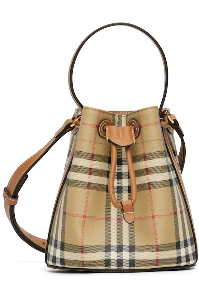 Burberry Бежевая сумка на завязках
Burberry Бежевая сумка на завязках