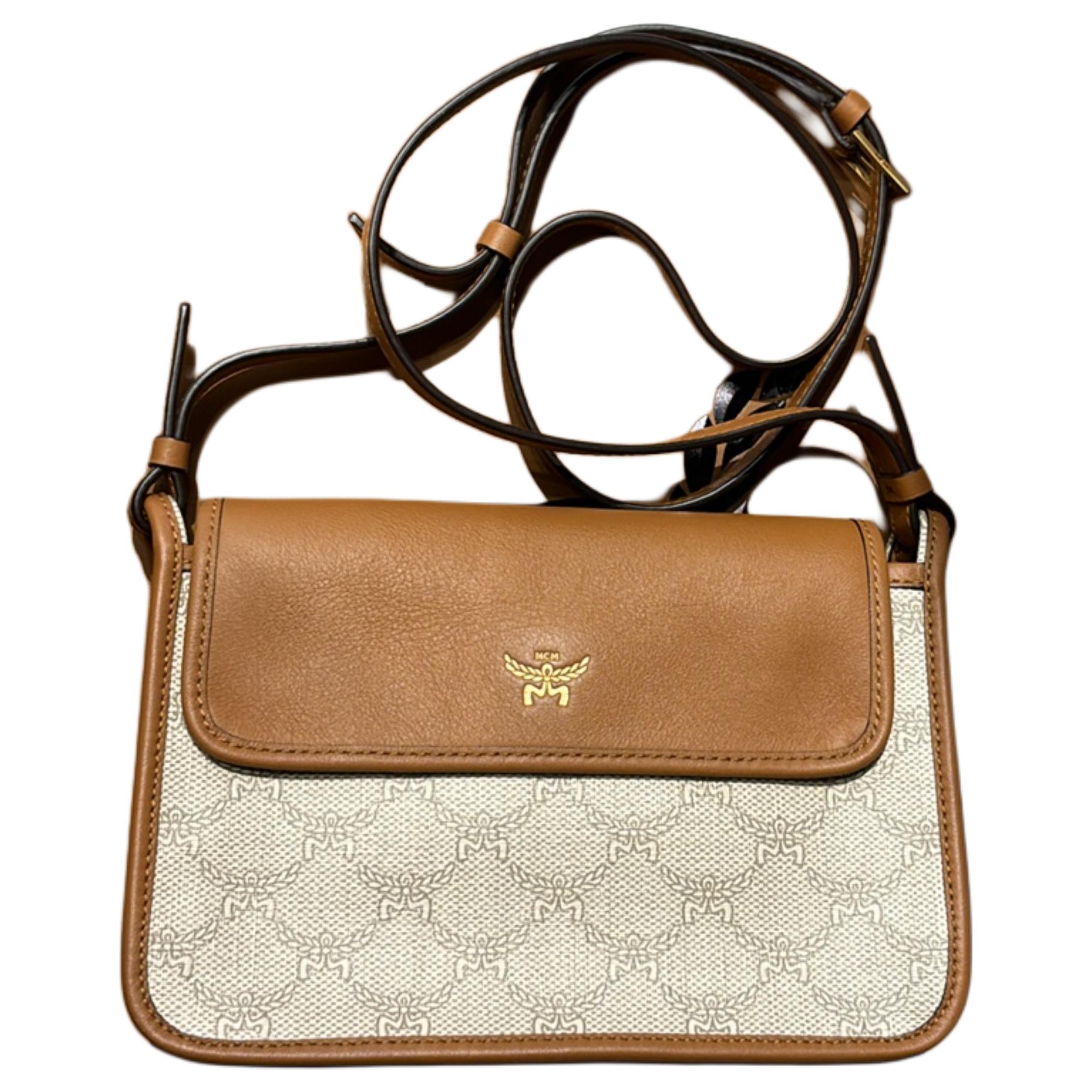 MCM Химмел полиуретановая женская сумка через плечо малая умбра
MCM Химмел полиуретановая женская сумка через плечо малая умбра
