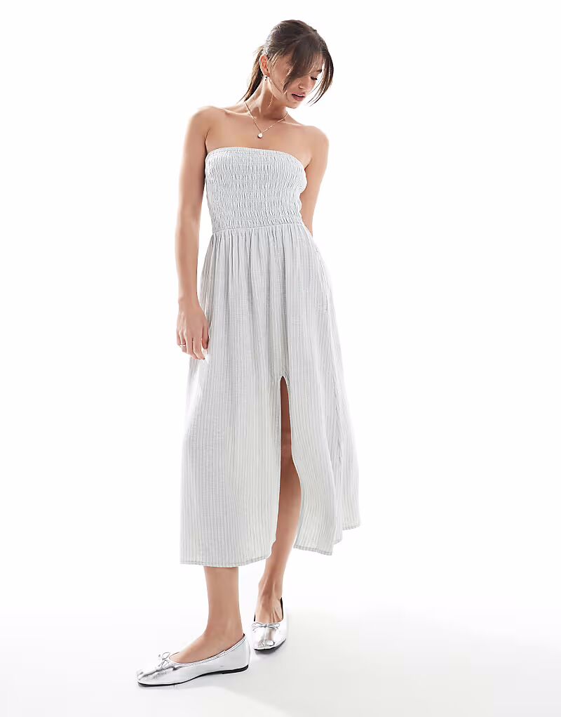 Платье миди Hollister без бретелек с заниженной талией и вставками в полоску шалфея
Платье миди Hollister без бретелек с заниженной талией и вставками в полоску шалфея