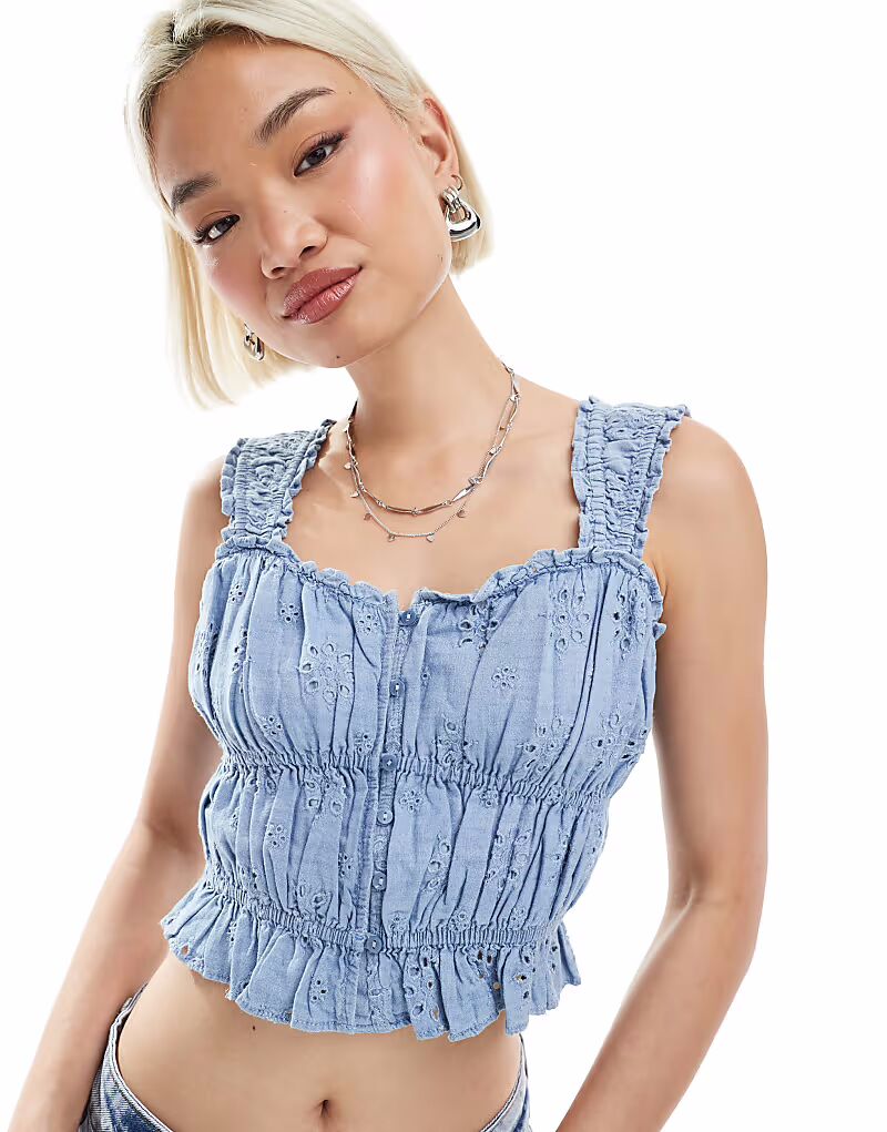 Укороченный топ Levi's с вышивкой синего цвета 
Укороченный топ Levi's с вышивкой синего цвета