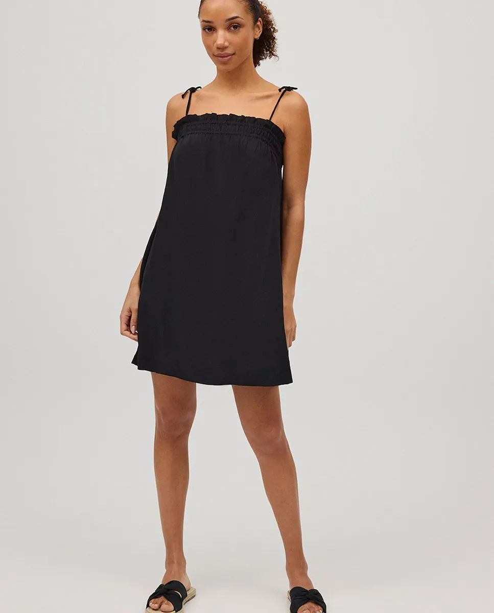 Короткое пляжное платье с завязанными бретелями и однотонным принтом Ysabel Mora, черный 
Короткое пляжное платье с завязанными бретелями и однотонным принтом Ysabel Mora, черный