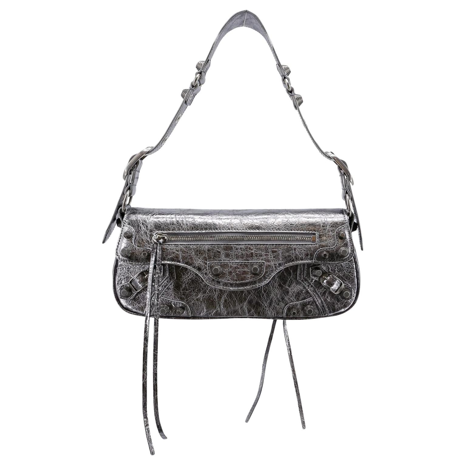 Balenciaga Сумка через плечо из ягненка Le Cagole серебристого цвета
Balenciaga Сумка через плечо из ягненка Le Cagole серебристого цвета