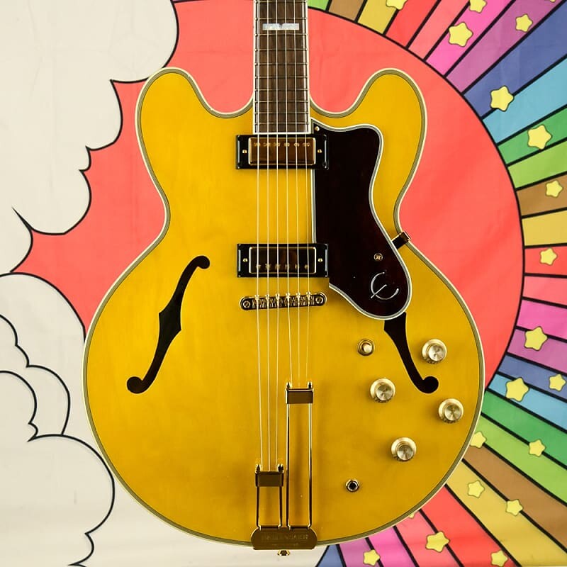 Электрогитара Epiphone Sheraton Semi-Hollow Body Electric Guitar - Natural, Gig Bag
Электрогитара Epiphone Sheraton Semi-Hollow Body Electric Guitar - Natural, Gig Bag