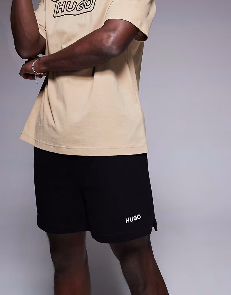 Свободные спортивные шорты HUGO RED Dulasho с логотипом черного цвета CO-ORD
Свободные спортивные шорты HUGO RED Dulasho с логотипом черного цвета CO-ORD