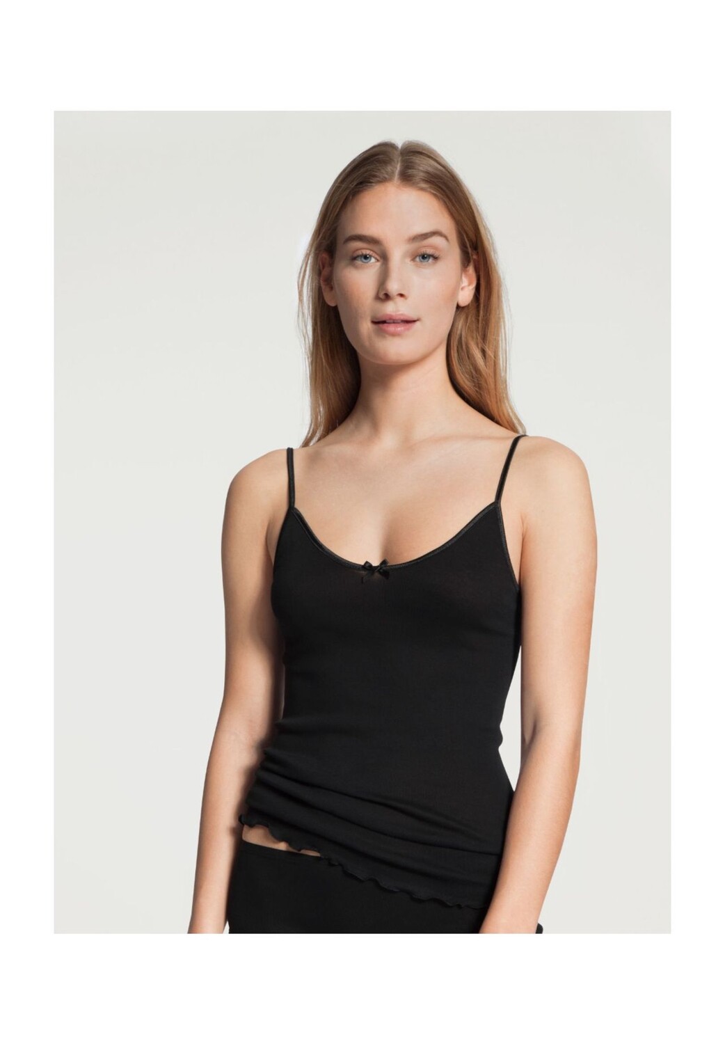 Классический легкий женский топ-спагетти приталенного кроя с волнистым подолом CALIDA, черный
Классический легкий женский топ-спагетти приталенного кроя с волнистым подолом CALIDA, черный