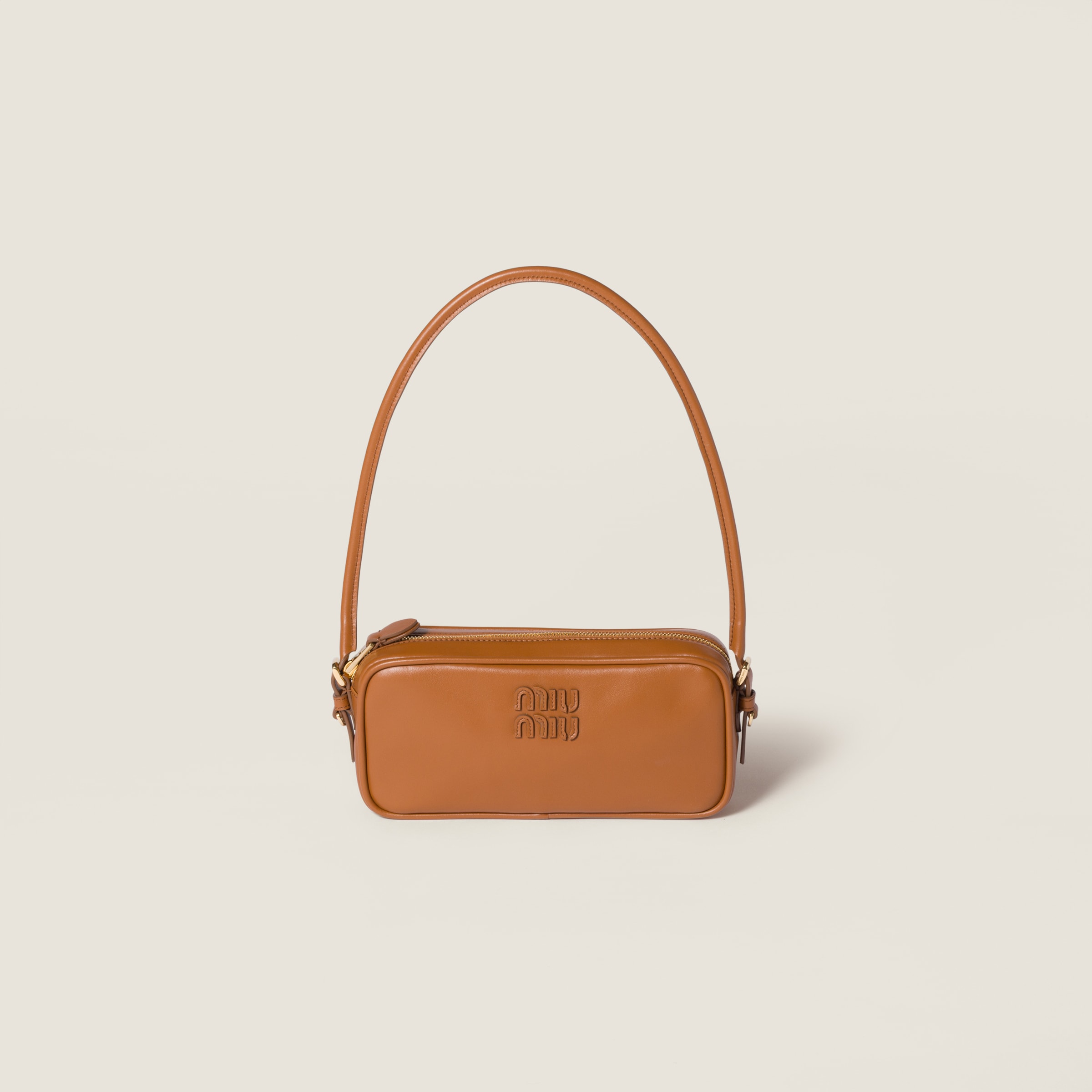 Кожаный мешочек MIU MIU, коньячный
Кожаный мешочек MIU MIU, коньячный