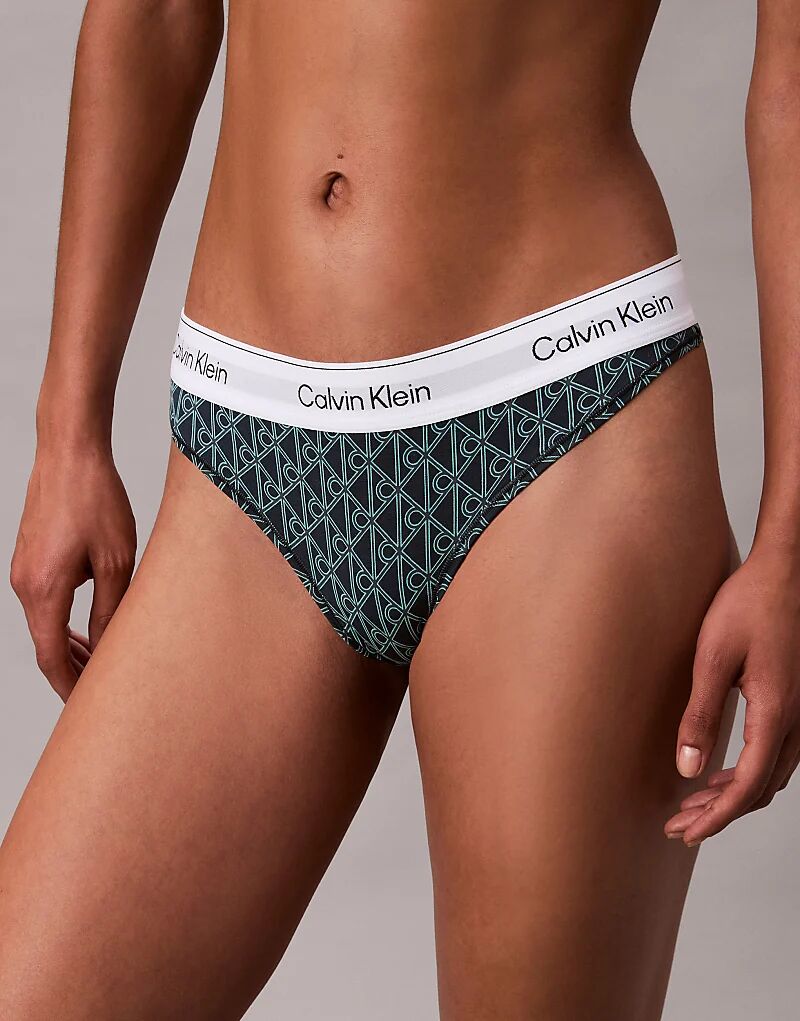 Трусики-стринги Calvin Klein Icon Cotton Modal с синим принтом эмблемы
Трусики-стринги Calvin Klein Icon Cotton Modal с синим принтом эмблемы