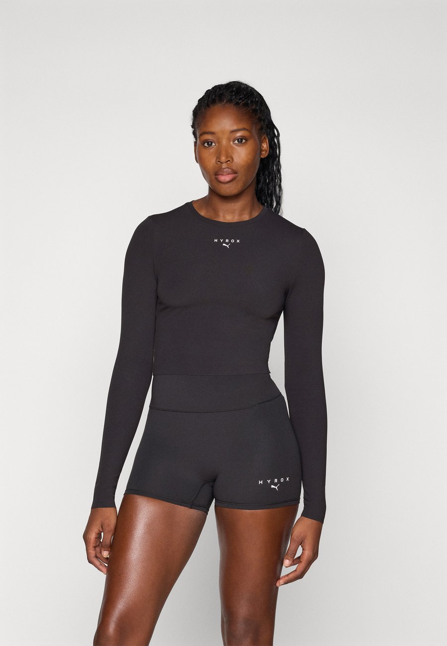 Топ Puma HYROX SHAPELUXE CROP TEE, Black
Топ Puma HYROX SHAPELUXE CROP TEE, Black