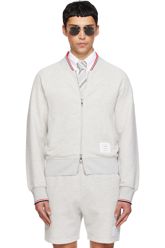 Thom Browne Серая толстовка-бомбер с петлевой спинкой из пике
Thom Browne Серая толстовка-бомбер с петлевой спинкой из пике