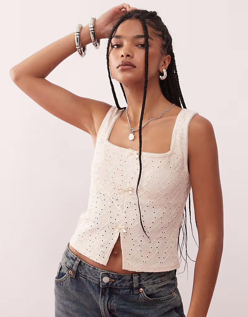 Reclaimed Vintage майка с разрезом спереди, кремового цвета
Reclaimed Vintage майка с разрезом спереди, кремового цвета