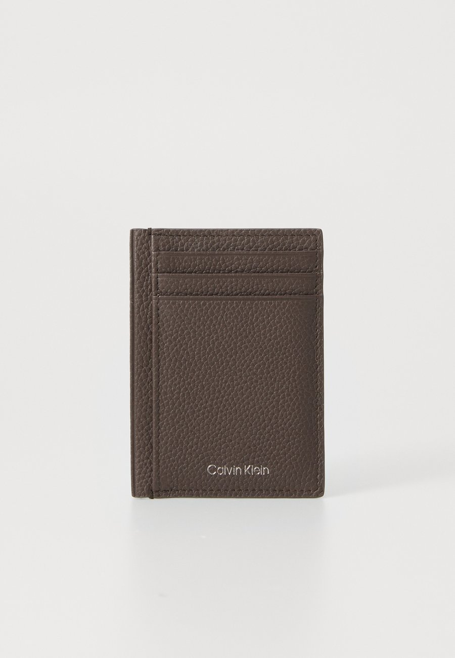 Кошелек Calvin Klein CARD CASE, Dark Brown
Кошелек Calvin Klein CARD CASE, Dark Brown
