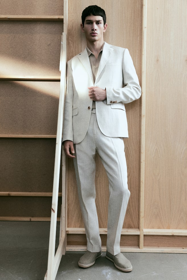 Элегантные брюки из льняной ткани классического кроя H&M, бежевый
Элегантные брюки из льняной ткани классического кроя H&M, бежевый