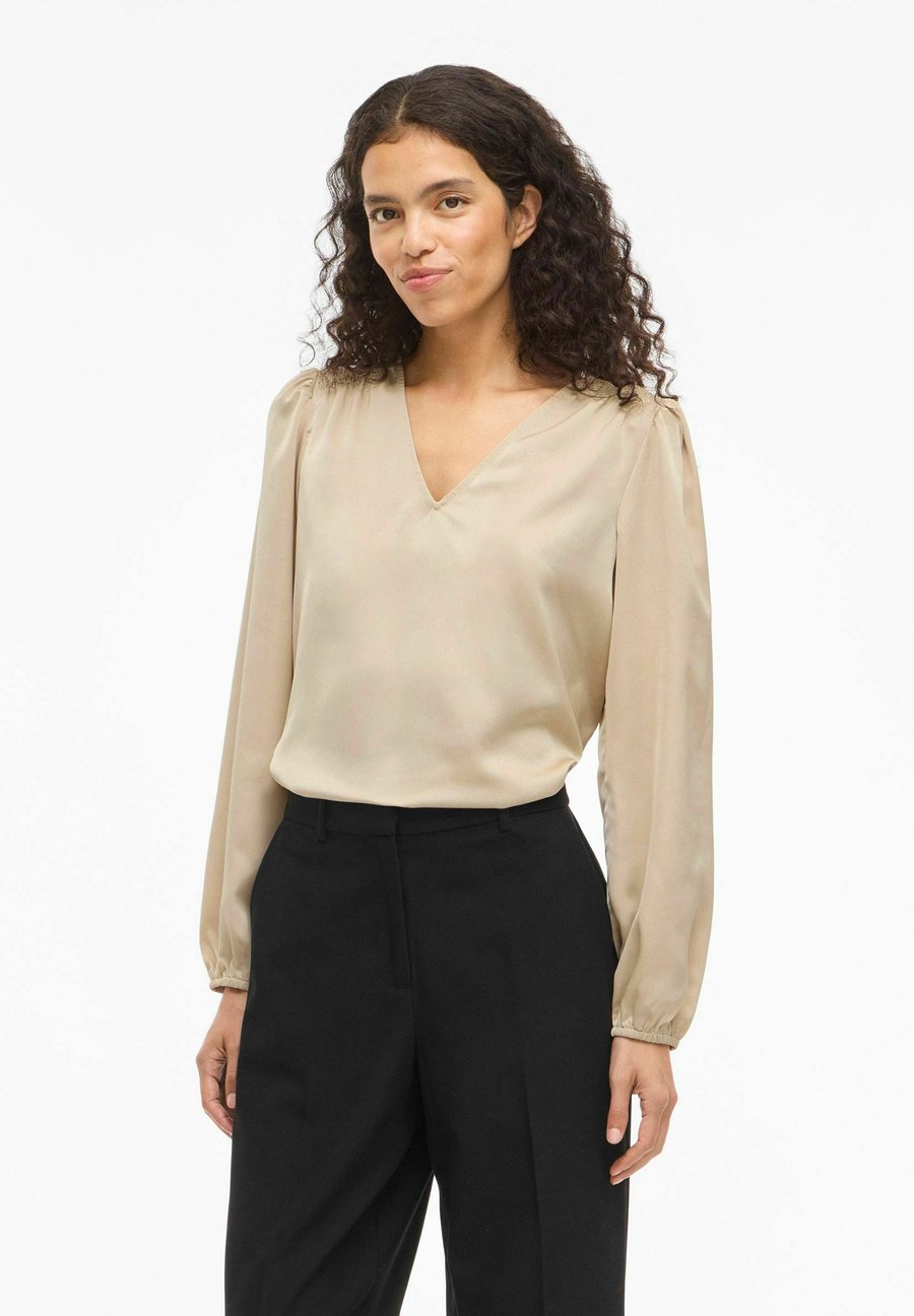 Блуза VILA VIELLETTE SMOCK, Cement/Beige
Блуза VILA VIELLETTE SMOCK, Cement/Beige