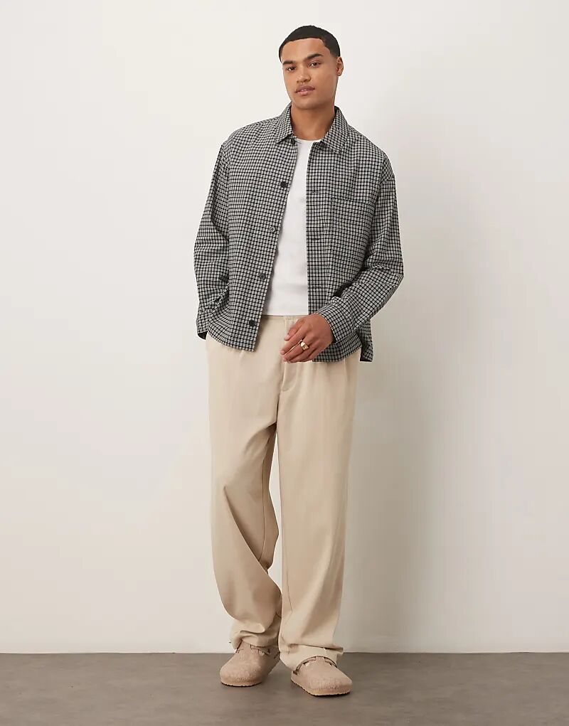 Свободная рубашка ARKET из плотного хлопка сирсакер в черно-белую клетку
Свободная рубашка ARKET из плотного хлопка сирсакер в черно-белую клетку