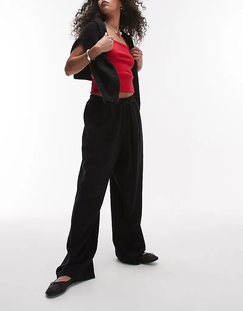 Льняные брюки-баллоны Topshop черного цвета
Льняные брюки-баллоны Topshop черного цвета