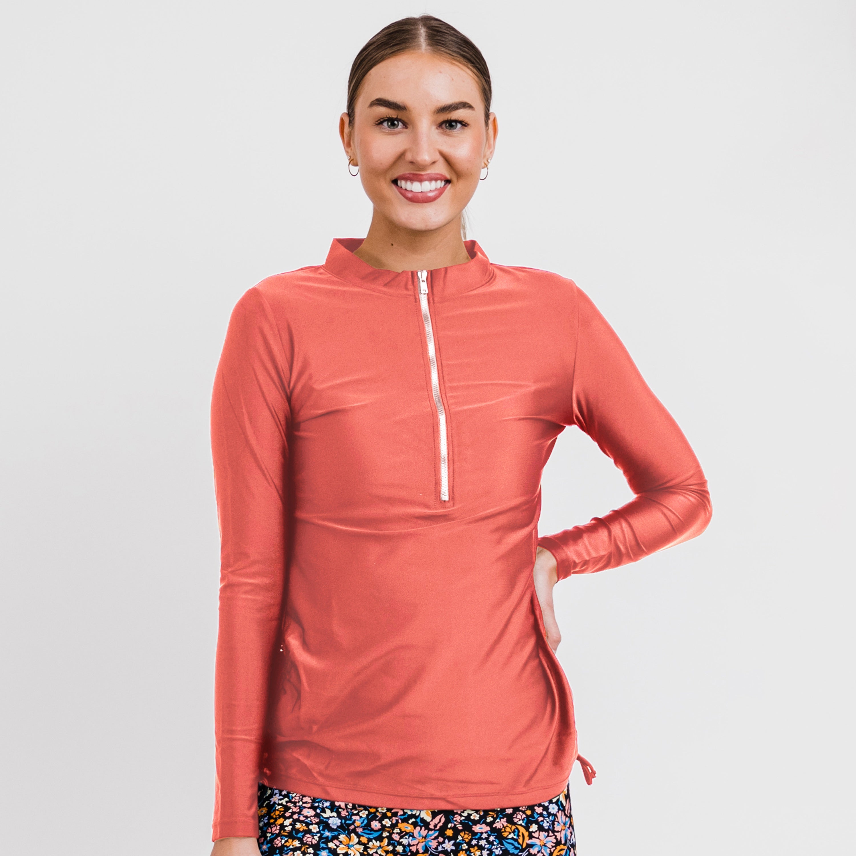 Женская футболка-рашгард Nora с длинными рукавами и молнией до середины груди, модель Plus Plus Calypsa, rust
Женская футболка-рашгард Nora с длинными рукавами и молнией до середины груди, модель Plus Plus Calypsa, rust