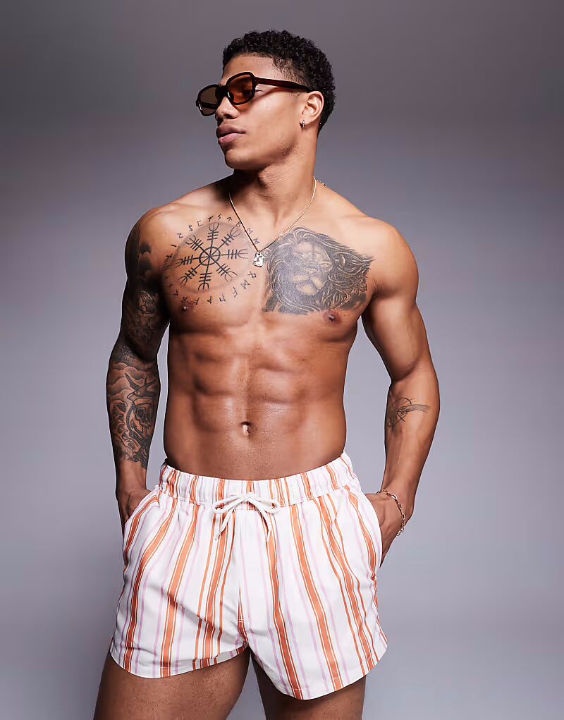 Плавки-шорты ASOS DESIGN суперкороткой длины в белую и оранжевую полоску
Плавки-шорты ASOS DESIGN суперкороткой длины в белую и оранжевую полоску