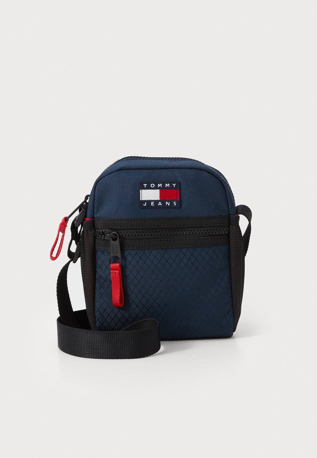Сумка через плечо ARCHIVE REPORTER - Across body bag Tommy Jeans, темно-синий
Сумка через плечо ARCHIVE REPORTER - Across body bag Tommy Jeans, темно-синий