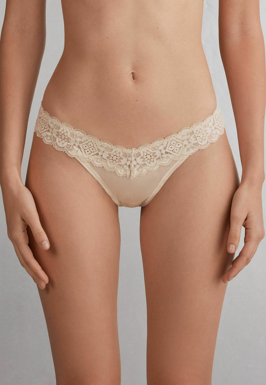 Трусы Intimissimi Thong, Natural/Beige
Трусы Intimissimi Thong, Natural/Beige