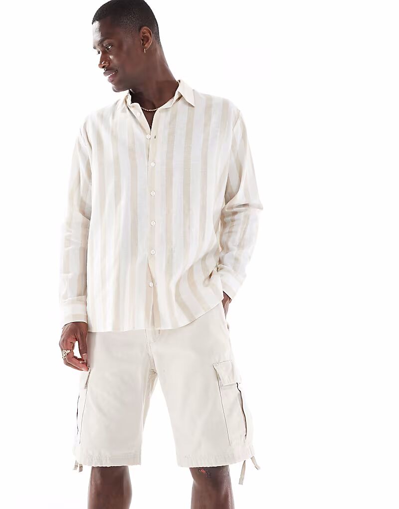 Короткие шорты-карго Jack & Jones бежевого цвета
Короткие шорты-карго Jack & Jones бежевого цвета