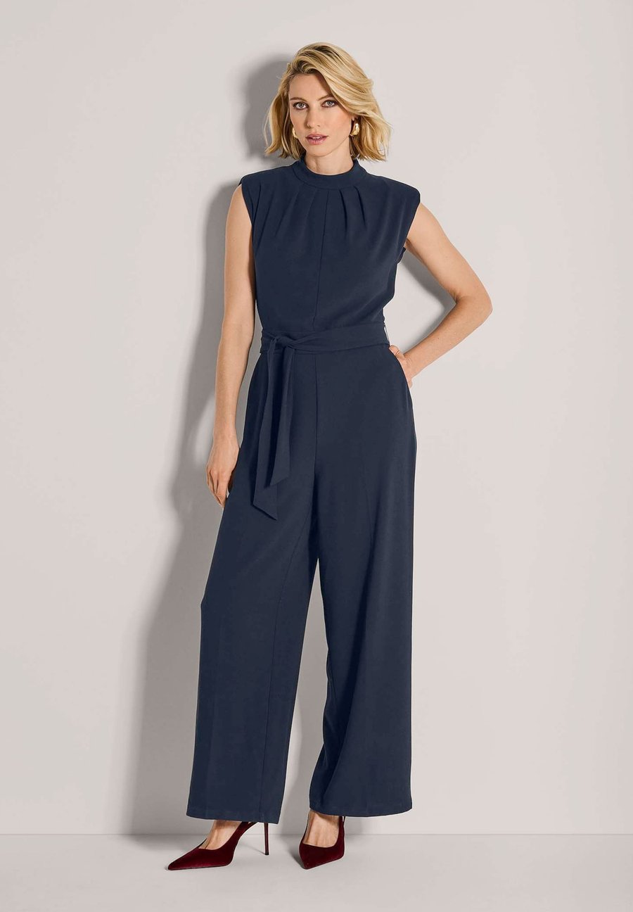 Комбинезон MADELEINE Jumpsuit, Navy/Blue
Комбинезон MADELEINE Jumpsuit, Navy/Blue