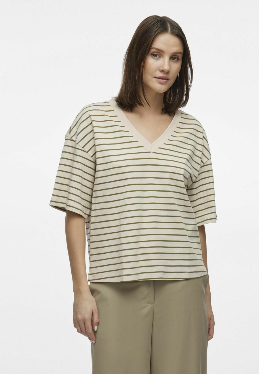 Футболка VILA MIT KURZEN ÄRMELN V-AUSSCHNITT, Beige
Футболка VILA MIT KURZEN ÄRMELN V-AUSSCHNITT, Beige