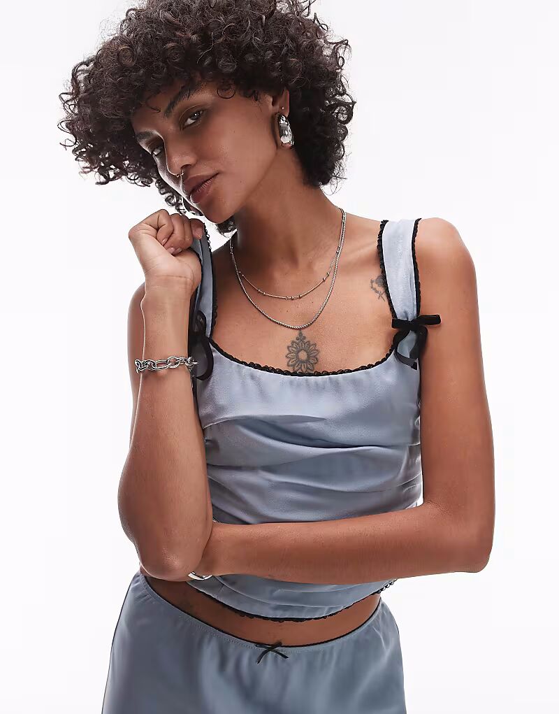 Серо-голубой корсет со сборками и бантом Nia Stan
Серо-голубой корсет со сборками и бантом Nia Stan