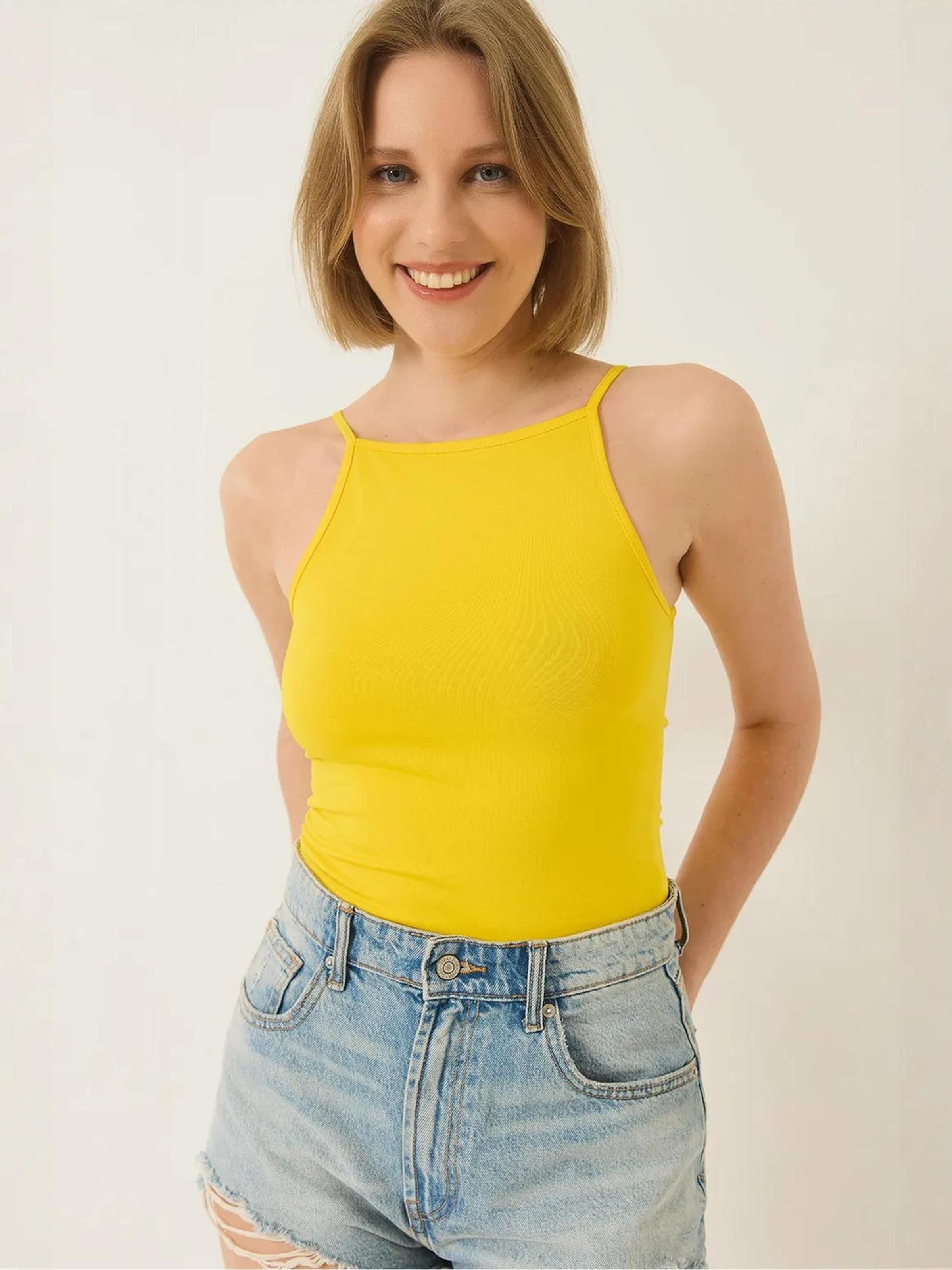 Bianco Lucci Топ в цвете лимон
Bianco Lucci Топ в цвете лимон