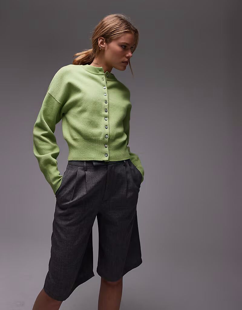 Плотный трикотажный кардиган Topshop зеленого цвета с приталенным лифом
Плотный трикотажный кардиган Topshop зеленого цвета с приталенным лифом