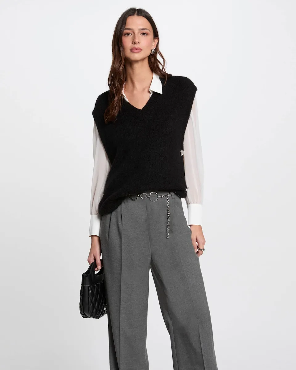 Женский безрукавный джемпер с декоративными пуговицами Morgan, черный
Женский безрукавный джемпер с декоративными пуговицами Morgan, черный