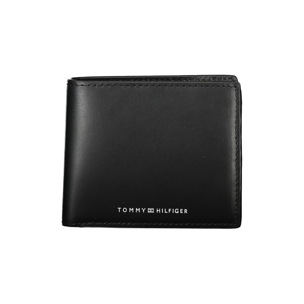 Элегантный мужской кожаный кошелек двойного сложения черного цвета Tommy Hilfiger
Элегантный мужской кожаный кошелек двойного сложения черного цвета Tommy Hilfiger
