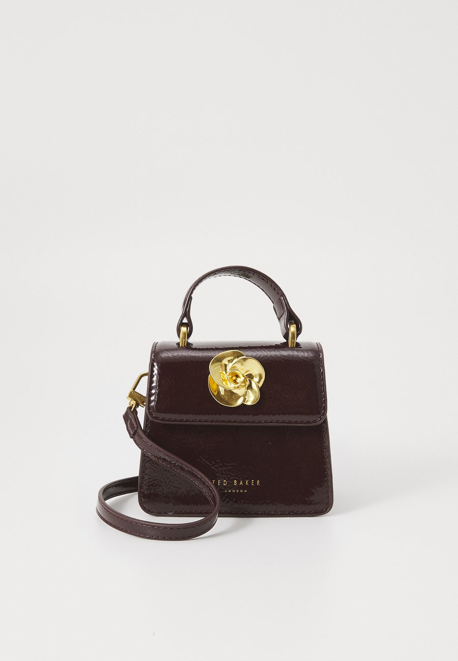 Сумка Ted Baker ROSELAH, Wine/Bordeaux
Сумка Ted Baker ROSELAH, Wine/Bordeaux