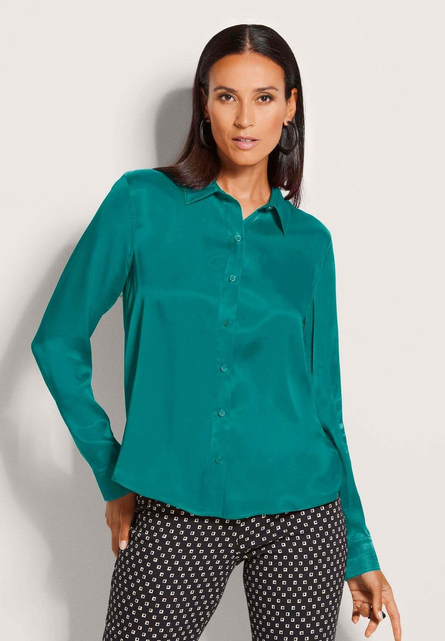 Блуза MADELEINE Button-down blouse, Petrol/Teal
Блуза MADELEINE Button-down blouse, Petrol/Teal