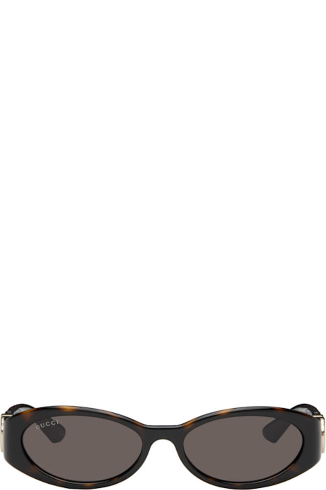 Солнцезащитные очки в овальной оправе коричневого цвета Gucci
Солнцезащитные очки в овальной оправе коричневого цвета Gucci