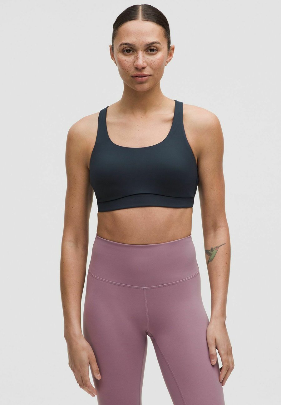 Бюстгальтер lululemon Energy Evolve , True Navy/Dark Blue
Бюстгальтер lululemon Energy Evolve , True Navy/Dark Blue