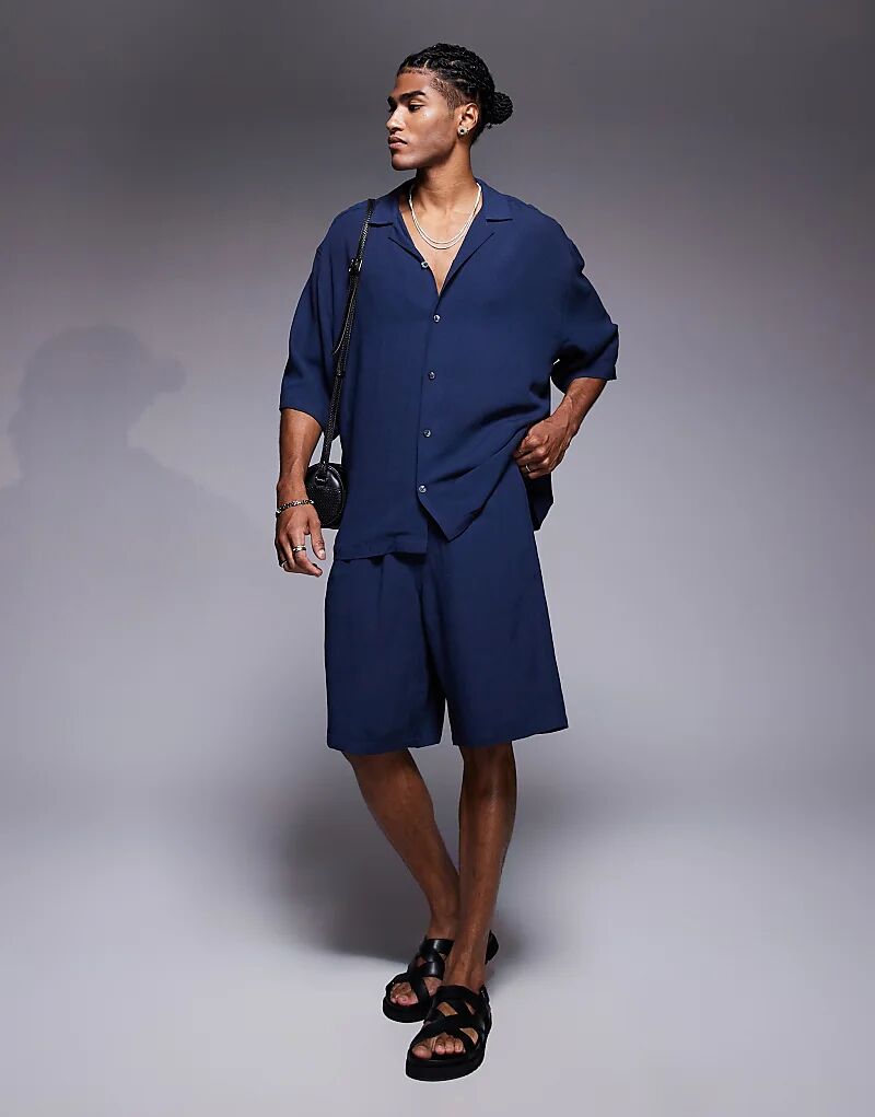 Длинные шорты ASOS DESIGN темно-синего цвета 
Длинные шорты ASOS DESIGN темно-синего цвета