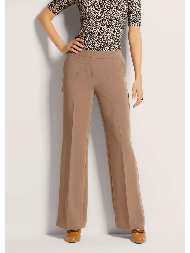 MADELEINE Широкие брюки-бандо карамельного цвета с отглаженными складками
MADELEINE Широкие брюки-бандо карамельного цвета с отглаженными складками