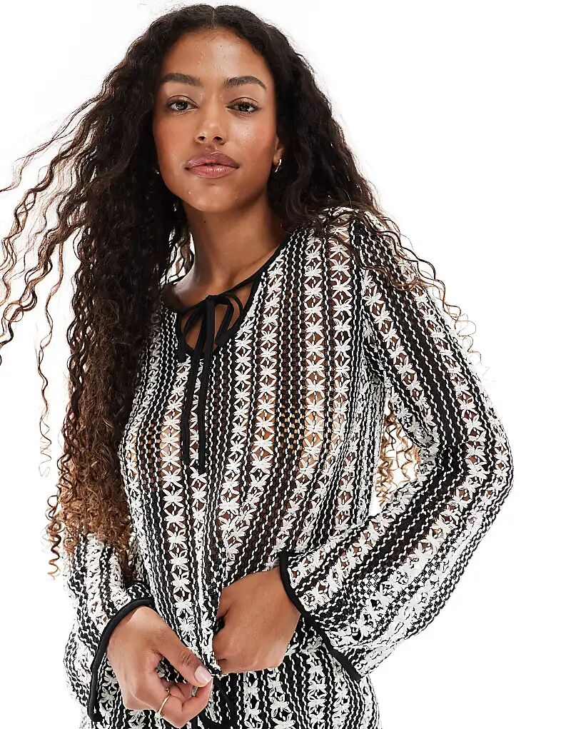 Ажурный топ с длинными рукавами Vero Moda в однотонную полоску
Ажурный топ с длинными рукавами Vero Moda в однотонную полоску