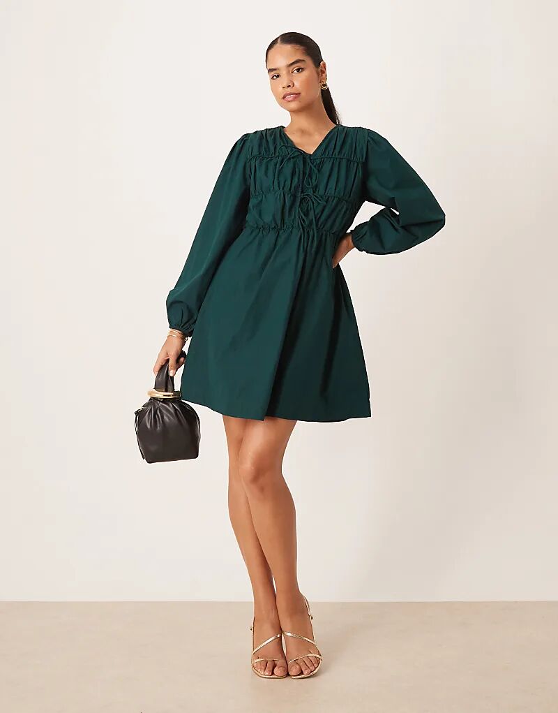 Мини-платье YAS с завязкой спереди и длинными рукавами, насыщенного зеленого цвета
Мини-платье YAS с завязкой спереди и длинными рукавами, насыщенного зеленого цвета