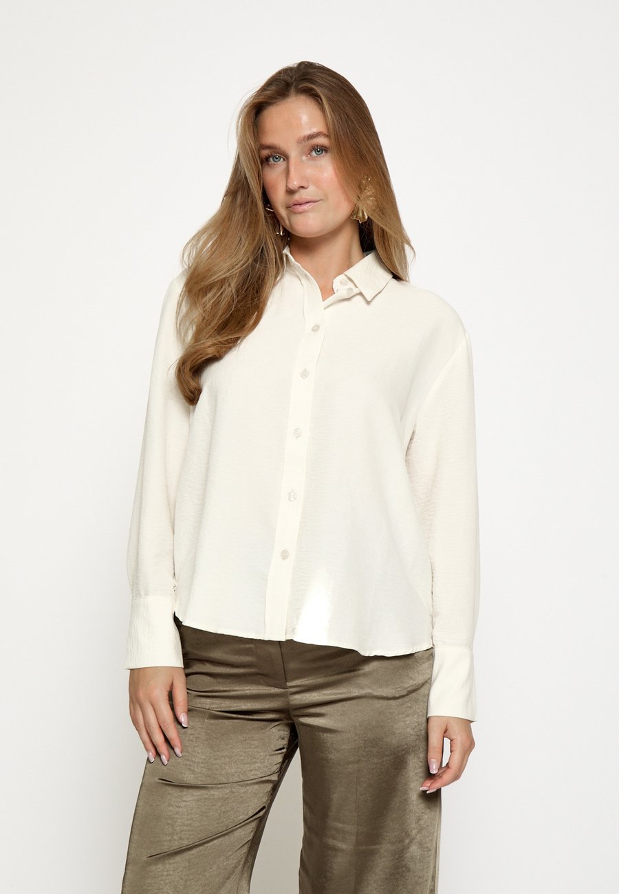 Блуза Desires Button-down blouse, Cloud Dancer/White
Блуза Desires Button-down blouse, Cloud Dancer/White