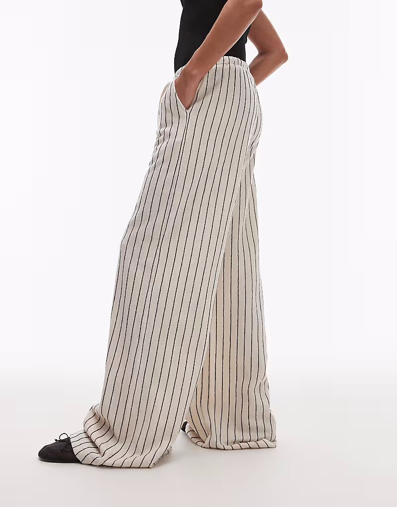 Трикотажные брюки Topshop из махровой ткани в полоску с монохромным принтом
Трикотажные брюки Topshop из махровой ткани в полоску с монохромным принтом