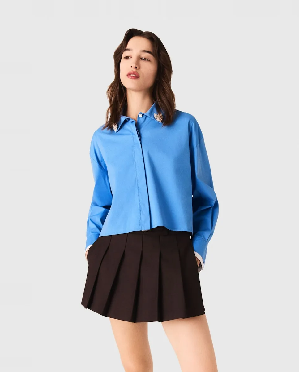 Женская рубашка со съемным украшением Maje, синий
Женская рубашка со съемным украшением Maje, синий