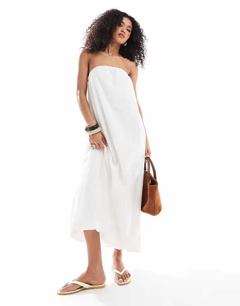 Длинное льняное платье-бандо Native Youth кремового цвета
Длинное льняное платье-бандо Native Youth кремового цвета