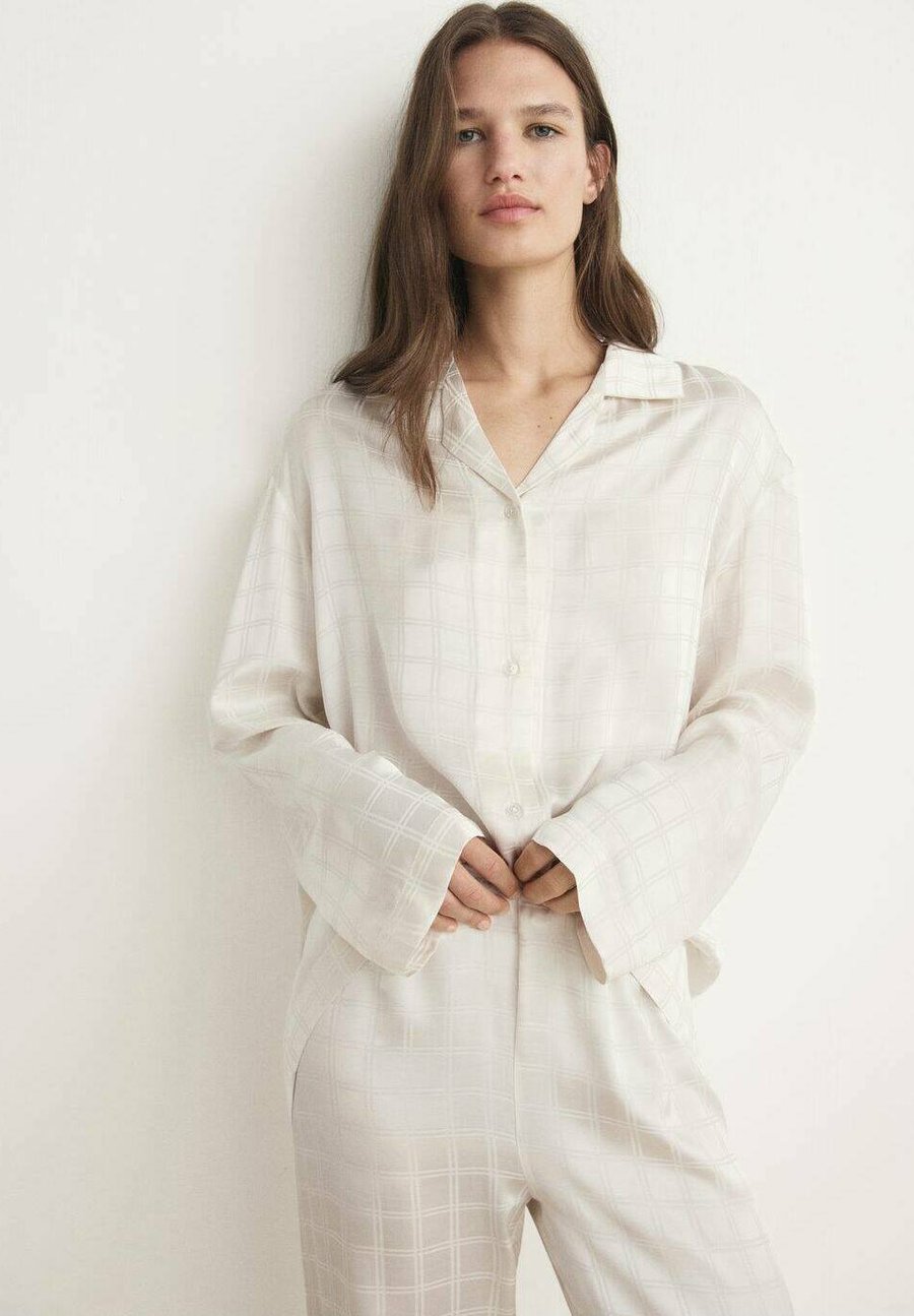 Пижамный топ Mango KOSTKOVANÁ, Slonová Kost/Off-White
Пижамный топ Mango KOSTKOVANÁ, Slonová Kost/Off-White