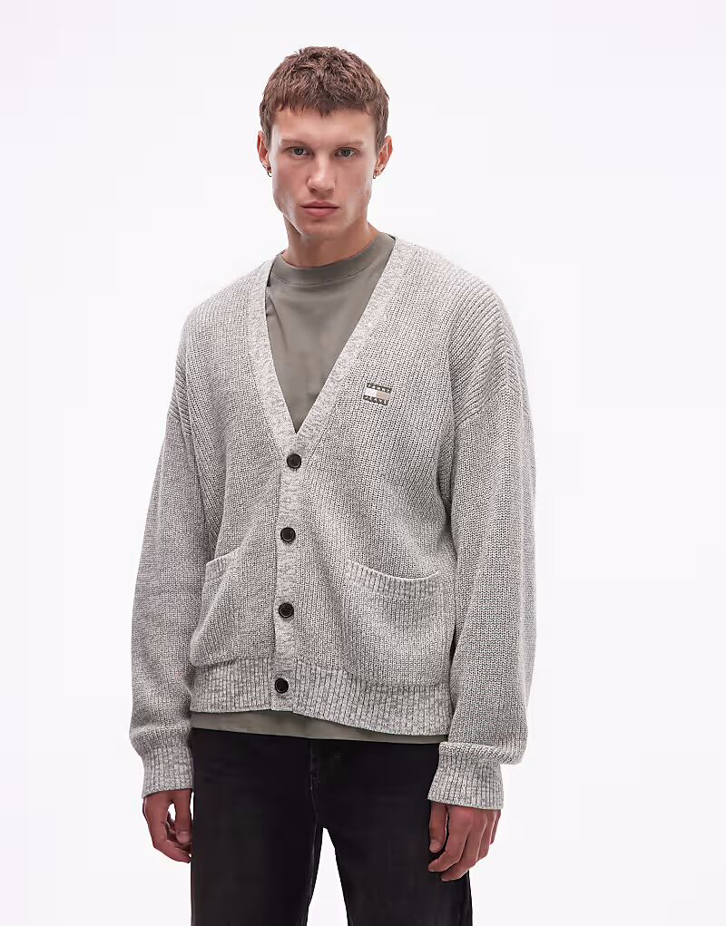 Свободный трикотажный кардиган серого цвета Tommy Jeans
Свободный трикотажный кардиган серого цвета Tommy Jeans