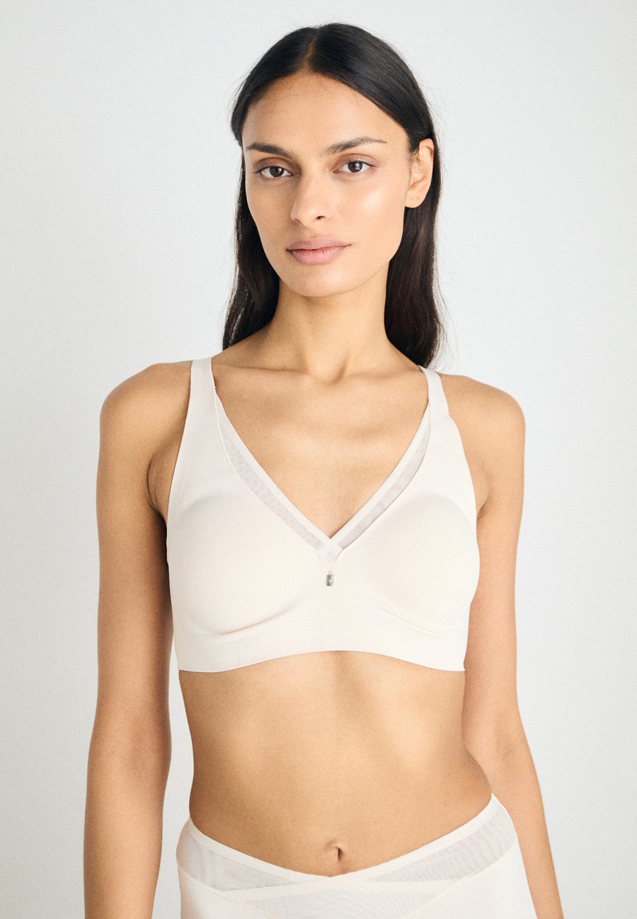 Бюстье Triumph TRUE SHAPE SENSATION, Fresh Powder/Beige
Бюстье Triumph TRUE SHAPE SENSATION, Fresh Powder/Beige