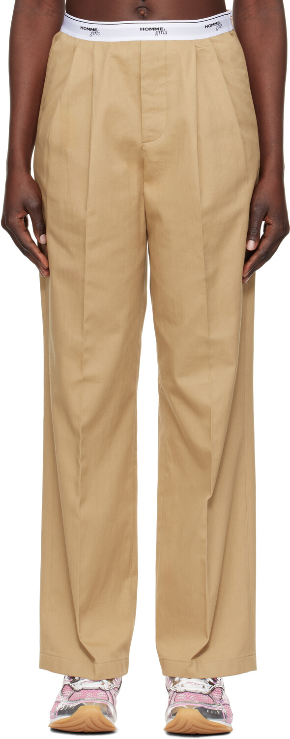 Бежевые брюки с эластичной резинкой на талии HommeGirls
Бежевые брюки с эластичной резинкой на талии HommeGirls