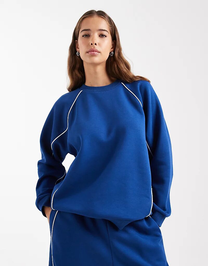 Спортивная толстовка COLLUSION с кантом в цвете кобальт
Спортивная толстовка COLLUSION с кантом в цвете кобальт