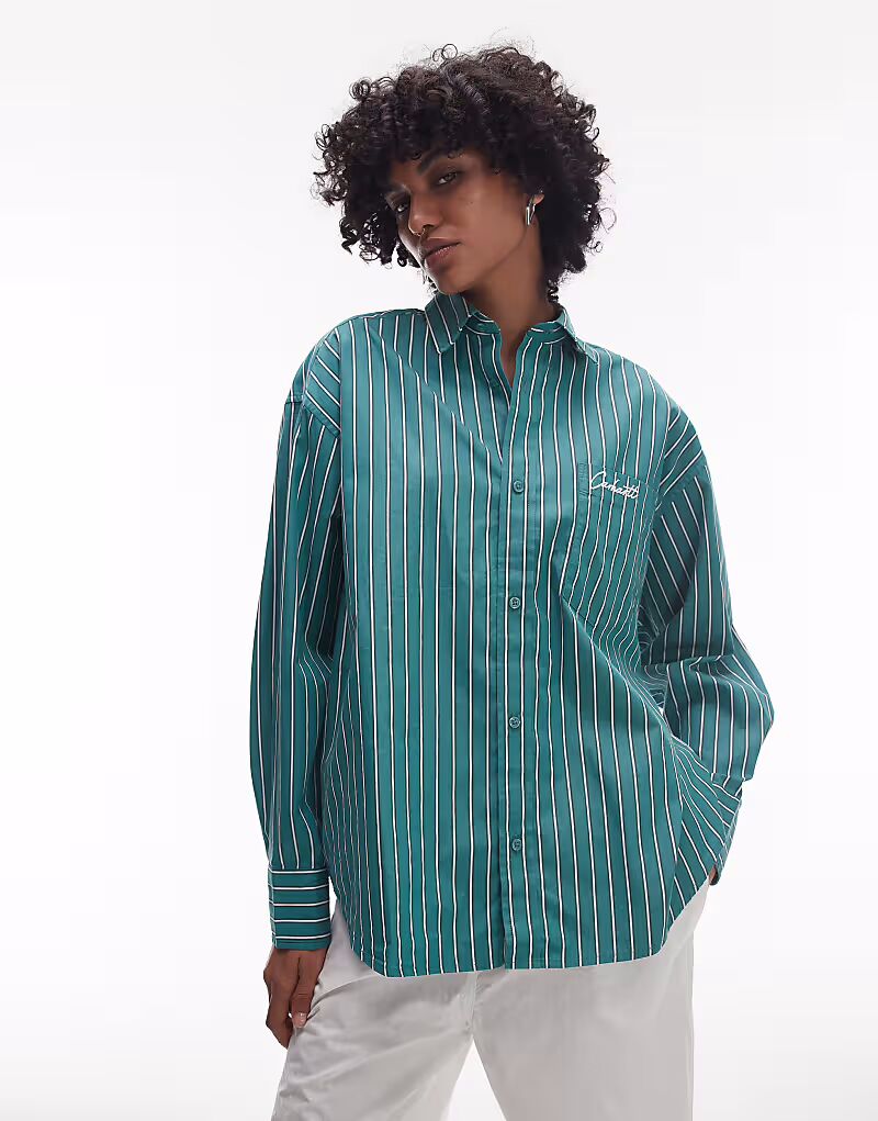 Рубашка Carhartt WIP Grimsby с длинными рукавами и логотипом в зеленую полоску
Рубашка Carhartt WIP Grimsby с длинными рукавами и логотипом в зеленую полоску