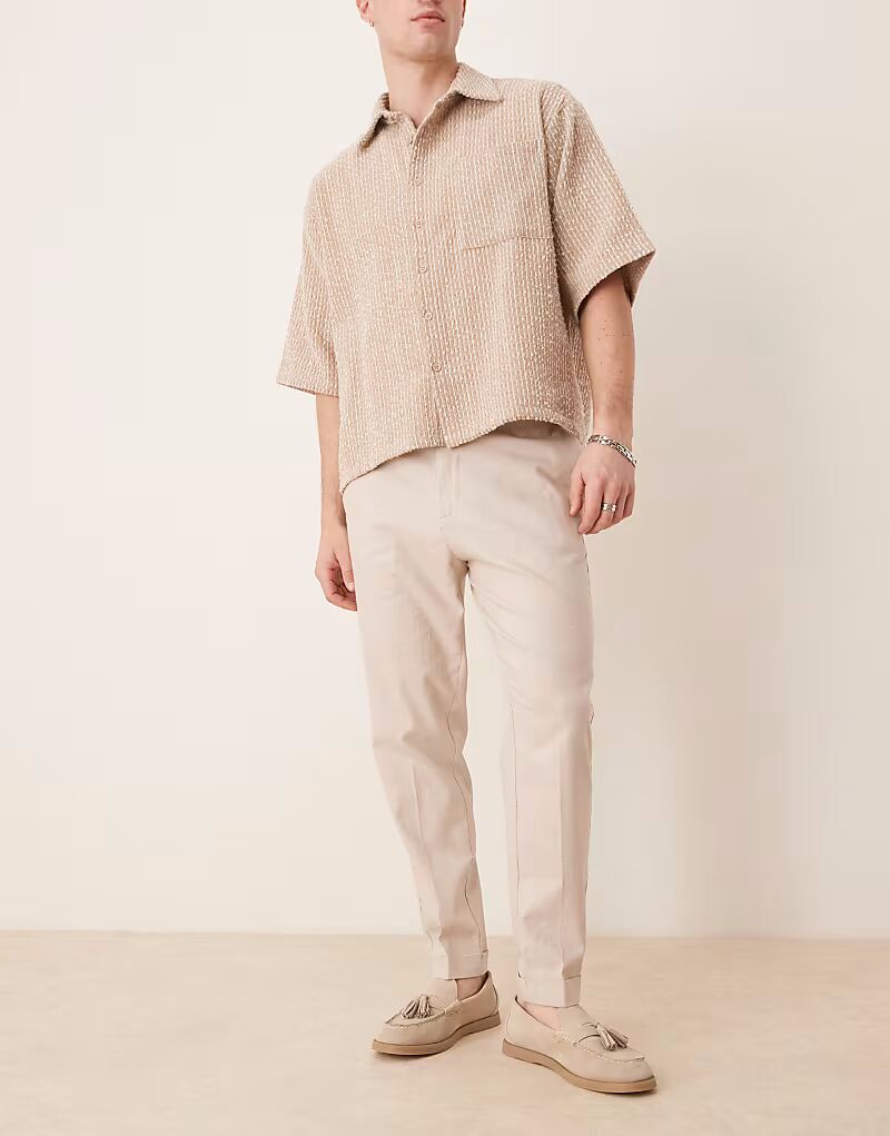 Зауженные брюки из льняной смеси бежевого цвета с отворотами Asos Design
Зауженные брюки из льняной смеси бежевого цвета с отворотами Asos Design